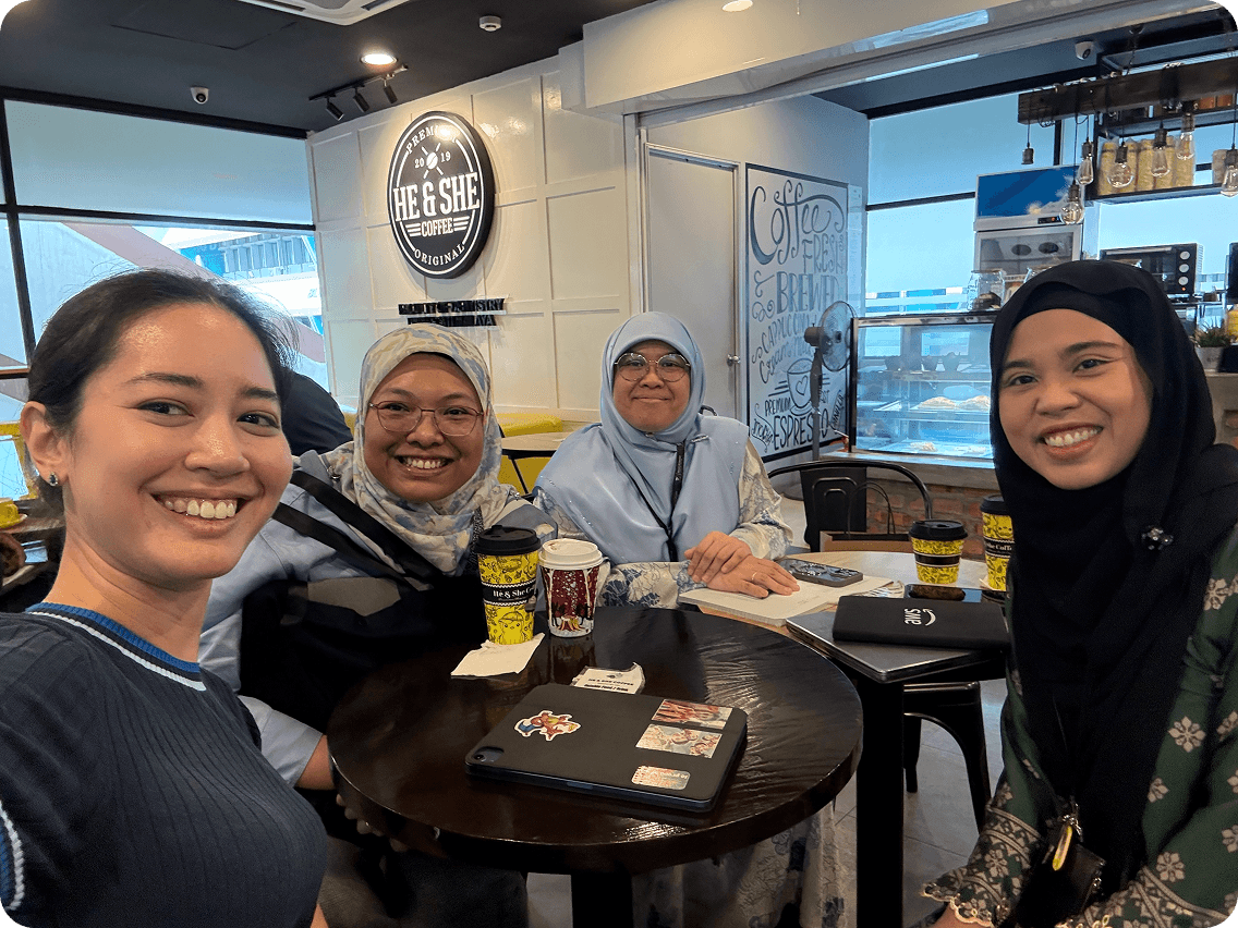 The MyGumHealth team meeting over coffee